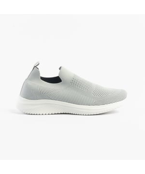 These casual women's slip-on shoes feature a textile upper, breathable lining, and rubber sole with a low heel, offering comfort and easy wear for everyday activities