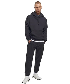 Expertly crafted for both casual and work wear, the Kruze Mens Tracksuit Set boasts unparalleled comfort and versatility. The crew neckline and long sleeves of the hoodie provide a timeless style, while the joggers feature an adjustable waistband and drawstrings for a perfect fit. Accompanied by side pockets and cuffed ankles, this set is ideal for any occasion. 52% Cotton, 48% Polyester. Available in Black, Grey and Navy colours.