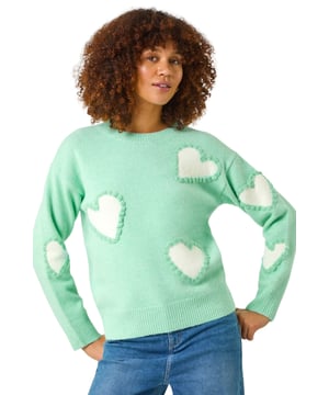 Fun Heart Knit Jumper from Roman. Spread love and warmth this Autumn/Winter with this fun heart crew neck jumper. Stay cosy with long sleeves and a classic round neckline helping you to stay stylish and comfortable throughout the season. Pair with your favourite jeans and ankle boots for a cute and casual look that will keep you feeling fabulous all day long!