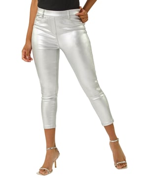 Metallic Coated Crop Jeggings from Roman. Take your style to the next level with these metallic coated crop jeggings. This smart pair is adorned with essential front and back pockets featuring functional belt loops for a practical edge. The jeggings are cut in a fitting shape, crafted from stretch woven fabric for all-day comfort. Perfect for any occasion, pair these jeggings with a blouse for a sophisticated look!