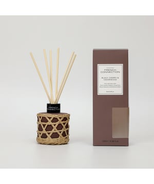 Infuse your space with warmth and sophistication using the French Connection Bamboo Collection Black Cherry and Cedarwood Reed Diffuser. This elegant home fragrance offers a rich blend of juicy black cherry and earthy cedarwood, creating a perfectly balanced scent that’s both fruity and grounding. Housed in a sleek, minimalist bamboo-accented bottle, it complements a variety of interior styles while providing continuous fragrance.

Ideal for living rooms, bedrooms, or entryways, this reed diffuser slowly releases scent over time.

The natural reeds absorb the fragrance oil and disperse the aroma gently into the air, offering a long-lasting and consistent scent experience.  

How to Use:  

Remove the stopper from the bottle.  

Insert the reeds into the fragrance oil.  

Allow 24–48 hours for the reeds to fully absorb the oil and begin diffusing the scent.  For a stronger fragrance, flip the reeds every few days.  

Place on a stable surface, away from direct sunlight or drafts, to ensure optimal performance.  

Enjoy a stylish and effortless scent solution with French Connection’s Black Cherry and Cedarwood Reed Diffuser.