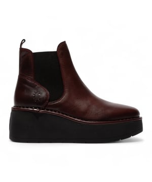 Mejora tu estilo otoñal con los botines HELY268FLY de Fly London. Diseñados para llamar la atención, este llamativo modelo presenta una plataforma gruesa y un tacón alto para un look moderno y audaz. La elegante parte superior de cuero se combina con refuerzos laterales elásticos, lo que facilita su colocación y extracción, garantizando un ajuste cómodo y ceñido. Con el característico sello trasero de Fly London y un tacón de 7,6 cm, estas botas combinan a la perfección moda y funcionalidad, ideales para el día a día o para completar conjuntos casuales. Exterior: Cuero. Forro: Microfibra. Suela: Goma TR. Altura del tacón: 7,6 cm. Plantilla: Microfibra. Estilo: Sin cordones con refuerzos laterales elásticos. Características: Suela de plataforma, comodidad.