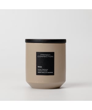 French Connection Relax from Stone Collection offers a luxurious and soothing scented candle, perfect for unwinding. Made with over 51% shea butter wax, it provides a clean, slow burn for over 37 hours. The rich, comforting blend of Warm Vanilla & Soft Cashmere creates a cozy ambiance, making it an ideal choice for relaxation and indulgence. This beautiful candle, housed in a sleek, stone-inspired container, adds a touch of elegance to any space.