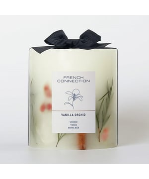 The French Connection Botanical Collection Vanilla Orchid Candle offers a warm, comforting fragrance that blends the creamy richness of vanilla with the soft, floral notes of orchid. This candle envelops your space in a cosy, inviting aroma, ideal for relaxation and unwinding. The subtle sweetness of vanilla combined with the gentle elegance of orchid creates a refined yet comforting scent that lingers delicately in the air. Housed in a sleek, stylish container, this candle serves as both an elegant decor piece and a luxurious, calming addition to any room.