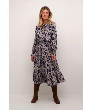 Dames midi-jurk met een comfortabele pasvorm, ruches halslijn, lange mouwen en elastische taille. Ideaal voor veelzijdig draagcomfort.  Fijne was 30°, niet bleken, niet in de droger drogen, Druipnat ophangen in de schaduw, koud strijken max. 110° C, Droogreiniging  100% Viscose