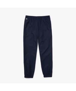 XH1641 Men’s Lacoste SPORT Lettered Bands Lightweight Tracksuit Pants Diamond taffeta (smooth  very lightweight woven fabric with a slightly shiny finish) and jersey lining Elasticised waistband with concealed drawstring Invisible side pockets Lacoste lettered side band appliqués Crocodile transfer on hip