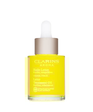 Experience the luxurious Clarins Lotus Face Treatment Oil, formulated for oily and combination skin types. This blend features 100% pure plant extracts and essential oils, including Rosemary, Geranium, Hazelnut Oil, and Lotus extracts, to balance your skin's natural oils. It refines texture, tightens pores, and locks in moisture, reducing the appearance of fine lines. For best results, apply a small amount to your cleansed face and neck while damp, focusing on areas of concern, and gently blot away excess oil.