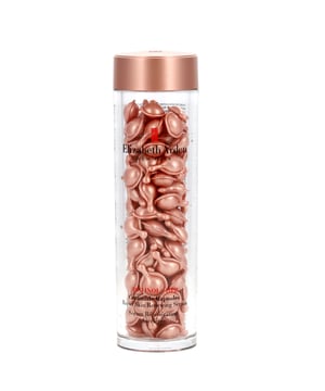 Transform your skincare routine with Elizabeth Arden's Retinol + HPR Ceramide Capsules. This advanced serum combines the powerful benefits of retinol and HPR ceramide to rejuvenate your skin, enhancing radiance and smoothness while visibly reducing wrinkles and pores. The unique formula strengthens the skin's moisture barrier with ceramides for deep, lasting hydration, while peptides work to improve firmness. For optimal results, apply to a cleansed face and neck every morning and evening, and always pair with SPF during the day.