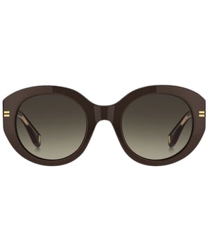 Elevate your style game with the Marc Jacobs Brown/Brown Gradient Sunglasses. These sunglasses are the perfect blend of sophistication and edge, offering a bold and confident look. Crafted with precision and attention to detail, these sunglasses are a must-have accessory for any fashion-forward individual. With its sleek, modern design and high-quality materials, it's no surprise that these sunglasses have become a fan-favorite. So why wait? Add a touch of luxury and elegance to your wardrobe with these exquisite sunglasses today!