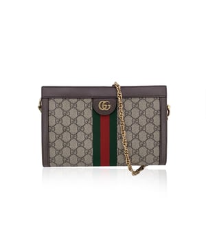 VINTAGE, RRP AS NEW
Step into the world of Gucci with the Ophidia Shoulder Bag, an exquisite piece from the Cruise 2018 collection that effortlessly blends retro charm with modern style. Crafted from beige GG Supreme monogram canvas, this bag is accented with rich brown leather trim, giving it an air of sophistication and timeless appeal. The iconic gold metal GG logo on the front nods to Gucci's 70s archives, while the signature green/red/green stripes, featured both on the front and back, bring a playful yet classic touch.  Designed with versatility in mind, this shoulder bag comes with a gold metal chain strap that adds a touch of glamour and can be worn comfortably on the shoulder. The bag's double hidden magnetic button closure ensures easy access while keeping your essentials secure. Inside, the teal silk lining offers a pop of color, with two main sections and one side open pocket, perfect for organizing your items.  From a smartphone, a long wallet, and lipstick, this bag comfortably holds your everyday essentials. The 'Gucci - Made in Italy' tag inside, with its serial number on the reverse, ensures the bag's ity and luxurious craftsmanship. The Ophidia Shoulder Bag is a statement piece that beautifully honors Gucci's rich heritage while embracing a contemporary sensibility, making it a must-have for the style-conscious. Retail price is 1750 euros. Condition Rating: A - EXCELLENTCondition Details: Gently used. Minimal wear of use on the internal lining. Please check the images carefully. Please ask if you need to know more details or if you have any doubts.Measurements (cm):Depth: 7.6Height: 16.5Length: 25.4Other Details: Dustbag? NoKeys? NoBox? No Measurments:  width: 76 mm length: 254 mm height: 165 mm