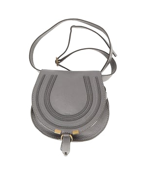 VINTAGE, RRP AS NEW
Elevate your look with the Chloé Small Marcie Saddle Shoulder Bag in chic grey leather, featuring the signature whipstitch trim and elegant curved silhouette that infuses bohemian charm into any outfit. Compact yet functional, it offers a chic hands-free experience with its streamlined flap and adjustable shoulder strap. **Styling Tip:** Drape it over a floral midi dress and chunky knit cardigan—add ankle boots for a polished, feminine ensemble that’s effortlessly day-to-night.

 Chloé Small Marcie Saddle Shoulder Bag in Grey Leather

Condition: Excellent
Signs of wear: No retail tag, No visible sign of wear., 
Packaging: None
Color: Grey
Material: Leather | calfskin leather
Size: One Size | One Size
Measurements: Width: 50; Height: 150; Length: 190
SKU: NAPPUGBBA506783W
