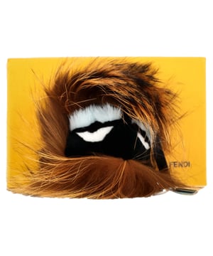 VINTAGE, RRP AS NEW
The Fendi Monster Bag Charm in brown fur adds a playful yet luxurious touch to any handbag with its iconic whimsical design and plush texture. Crafted from premium materials, it’s a standout accessory that instantly elevates your everyday carry. **Styling Tip:** Clip it onto a neutral-toned tote or structured bag to inject personality and a pop of fun into your look.

Fendi Monster Bag Charm in Brown Fur

Condition: Excellent
Signs of wear:  No sign of wear.
Packaging: None
Color: Brown
Material: Fur | fur
Size: One Size | One Size
Measurements: 
SKU: NAPPUGBAC501155W