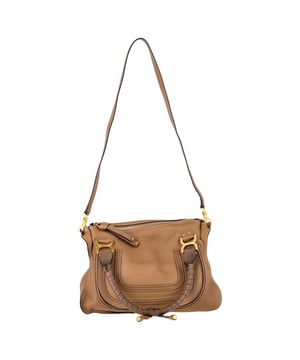 VINTAGE, RRP AS NEW
The Chloé Medium Marcie Handbag in rich brown calf leather blends bohemian charm with timeless sophistication. Its signature curved silhouette and hand-stitched detailing make it a chic yet practical everyday companion. **Styling Tip:** Complement its earthy tone with flowy fabrics, denim, or a classic trench for an effortlessly polished look.

Chloé Medium Marcie Handbag in Brown Calf Leather

Condition: Excellent
Signs of wear: No retail tag, No visible sign of wear., 
Packaging: Dust bag
Color: Brown | ochre
Material: Leather | calfskin leather
Size: One Size | One Size
Measurements: Width: 115; Height: 270; Length: 360; Handle drop: 150; Strap length: 0
SKU: NAPPUGBBA496252W