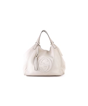 VINTAGE, RRP AS NEW
This Gucci Off-White Leather Large Soho tote bag is crafted from supple and soft pebbled leather and features the iconic bold GG logo embroidered on the front and an off-white leather tassel to the side.The bag has double flat leather handles, an open top with clasped middle closure, beige linen interior lining with one zip pocket and two slip pockets, five protective base studs, and light gold tone hardware.The bag is in good condition yet the exterior leather is slightly soiled. It shows scuffing on the bottom corners. The leather around the glazing at the top side edges and at the handles is slightly peeling off. The interior fabric is slightly soiled as well.Product code:282308 002123.
Gucci Gucci Off-White Pebbled Calfskin Large Soho Shoulder Bag
Original price: USD 2240
Color: white | cream
Material: Leather | Calfskin leather
Condition: good
Size: One Size
Sign of wear: No
SKU: 52805 / GLB6058 / GLB6058 
 Gucci Off-White Pebbled Calfskin Large Soho Shoulder Bag
Color: white | cream
Material: Leather | Calfskin leather
Condition: good
Size: One Size | One Size
Sign of wear: No
SKU: 444395 / GLB6058 / GLB6058 
Dimensions:  Length: 390 mm, Width: 220 mm, Height: 365 mm