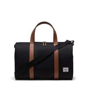 Carry on the go. Herschel re-invented their bestselling duffle for carry-on travel. Built with a padded laptop sleeve and trolley strap, it attaches to your luggage for your next trip.