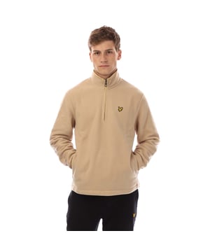 Mens Lyle And Scott Quarter Zip Fleece in beige.- Funnel neck.- Quarter zip fastening.- Side pockets.- Ribbed cuffs.- Embroidered Golden Eagle Lyle & Scott logo to chest.- Fleece. - 100% Polyester.- Ref: ML1738VW996