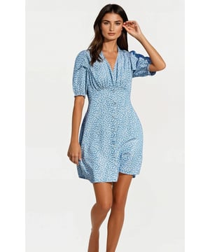This dress is meant for your summer wardrobe. With a button-through front, short puff sleeves and a flattering V-neck. Crafted from supersoft Tencel™, it drapes beautifully against your skin for effortless comfort. A versatile summer staple that transitions seamlessly through any occasion.