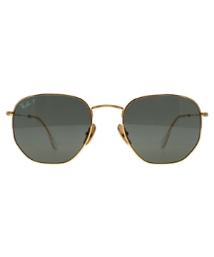 Ray-Ban Square Unisex Polished Gold Green G-15 Polarized Hexagonal Titanium RB8148  Sunglasses offer a bold, modern twist on the classic geometric shape, combining sharp, hexagonal lenses with a lightweight titanium frame for a sleek, durable design. Known for their strength and corrosion resistance, the titanium frame ensures a comfortable fit without sacrificing style. The sunglasses provide excellent UV protection, while the unique shape adds a distinct edge to any look. With a minimalist yet sophisticated aesthetic, the RB8148 sunglasses are perfect for those seeking a refined, fashion-forward accessory that stands out in both urban and outdoor settings.