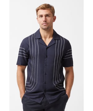 This striped shirt from French Connection is a great addition to the wardrobe. Features an all-over stripe stitch design, open collar button fastening, and short sleeves. This shirt is great for warmer days with its breezy shape and fabric.