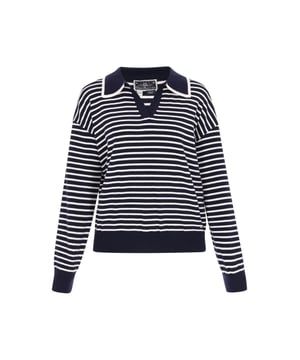 Stylish and comfortable, the sweater from the Maritime Collection is the perfect choice for lovers of casual and timeless fashion. The loose-fit model with a characteristic polo collar and long sleeves guarantees maximum comfort and freedom of movement. The dropped shoulder line gives it a fashionable, casual look, while the knitted structure and classic striped pattern emphasize its nautical character. Perfect for everyday wear. This sweater is the essence of everyday fashion with a touch of seaside ease.  Pullover