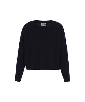 A classic knit sweater from the Maritime Collection. With a loose fit and dropped shoulders, it showcases a textured cable pattern for casual style. The round neckline and long sleeves ensure comfort, while the ribbed hem provides a cozy finish. Perfect for layering or wearing alone on chilly days.  Pullover