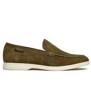 The Simon Carter Tanius Slip On brings style to contemporary menswear with its rich green suede construction and dinosaur print lining. These premium loafers feature luxurious leather sock and lining for all-day comfort, while the durable rubber sole ensures reliable traction. Complete with an exclusive branded shoe bag, they're perfect for the modern gentleman who appreciates distinctive details and museum-quality craftsmanship.