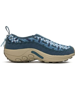 The Merrell Jungle Moc Evo Woven brings eco-conscious design to performance footwear. These men's blue trainers feature a distinctive knitted nylon upper with 100% recycled laces and webbing, demonstrating Merrell's commitment to sustainability. Practical features include a protective rubber heel for durability and breathable recycled mesh lining with CleanSport NXT odour controlâkeeping you fresh during active adventures. The reliable rubber sole provides excellent traction for your outdoor explorations.