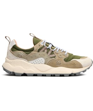 Discover the Flower Mountain Yamano 3, a distinctive running-inspired trainer that blends functionality with natural elements. The lush green colorway showcases premium suede and nylon construction, while leather lining offers superior comfort against your feet. Natural cork antibacterial insoles provide a fresh feel all day long. Thoughtful details like nylon pull tabs and the signature branded leather patch elevate these lightweight trainers, supported by a responsive EVA midsole and durable rubber outsole.
