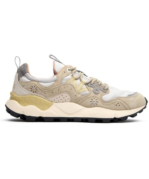 The Flower Mountain Yamano 3 Uni trainers blend outdoor inspiration with contemporary design. Crafted with premium nylon and suede uppers, these natural-toned running-style shoes deliver both durability and style. The distinctive branded leather patch adds character, while cork antibacterial insoles provide natural freshness. Practical touches include convenient pull tabs and a lightweight EVA midsole/rubber sole combination that ensures all-day comfort. Perfect for the urban explorer who values Japanese-inspired quality craftsmanship and understated aesthetics.