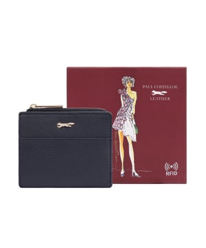 Discover the Tilly Card and Coin Purse, a sleek and practical accessory designed to keep your essentials organized in style. This purse features an exterior display section, allowing you to easily access your most-used bank or travel cards while on the go. The iconic fox logo adds a touch of sophistication, making it a must-have for anyone who values both form and function. Perfect for everyday use or travel, the Tilly purse is an essential companion for your busy lifestyle.