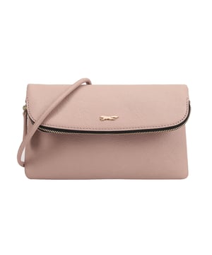 The Paul Costelloe CHARON cross-body bag is basically a two-in-one deal as it can also be converted into a clutch. Its leather body is suspended from a detachable shoulder strap which can be whipped off in an instant, and the edge of the foldover magnetic flap is fitted with a zipper for even more storage space on top of the roomy interior.