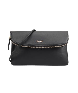Discover the Paul Costelloe Charon cross-body bag, designed for style and functionality. This chic bag effortlessly transforms into a clutch, making it perfect for any occasion. Crafted from high-quality leather, it features a detachable shoulder strap for versatility. The foldover magnetic flap not only adds a touch of elegance but also includes a zipper for extra storage, ensuring you have ample space for your essentials. Elevate your accessory game with the Charon bag, a must-have for fashion-forward individuals.