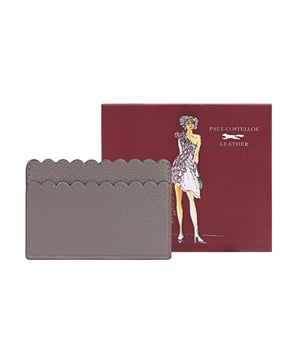 Introducing our Elegant Leather Card Holder, meticulously crafted from soft genuine leather. This stylish accessory features exquisite scallop detailing that adds a touch of sophistication. Perfectly designed to hold your travel or bank cards, this card holder is both practical and chic. It comes beautifully packaged in a gift box, making it an ideal gift for yourself or a loved one. Elevate your accessory game with this must-have item that combines functionality with elegance.