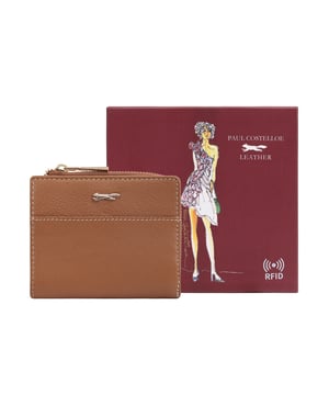 Discover the Tilly Card and Coin Pouch, the perfect blend of style and practicality. This sleek accessory is designed to keep your cards and coins organized effortlessly. It features an exterior display section for quick access to your essential bank or travel cards, making it ideal for those on the go. The iconic fox logo adds a sophisticated touch, elevating your daily accessories while ensuring functionality. Whether you are traveling or just out and about, the Tilly Pouch is your go-to companion for a seamless experience.
