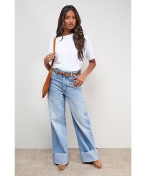 Distinctive turnup hem detail creates a contemporary silhouette
        Straight leg design offers a relaxed, comfortable fit
        High-rise waistband for a flattering shape
        Classic five-pocket styling with traditional stitching
        Wide leg opening with substantial cuff detail for a fashion-forward look
    
    These Oasis denim straight leg jeans combine timeless style with modern detailing. The relaxed fit and statement turnup hem create a fresh, contemporary look that's perfect for everyday wear. Style with a simple white tee and tan accessories for an effortlessly chic daytime ensemble, or pair with a floral blouse and ballet flats for weekend brunches and casual gatherings. The versatile straight leg silhouette works beautifully with both fitted and oversized tops, making these jeans a true wardrobe staple. For cooler days, layer with an oversized cardigan or denim jacket and trainers for a casual yet put-together look. The high-rise waist and relaxed fit through the leg ensure all-day comfort without compromising on style.