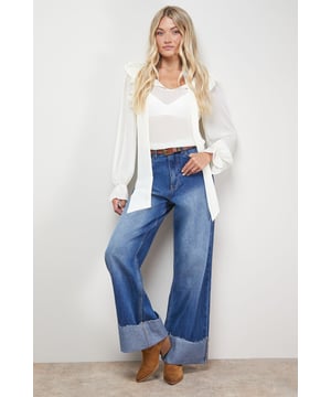 Distinctive turnup hem detail creates a contemporary silhouette
        Straight leg design offers a relaxed, comfortable fit
        High-rise waistband for a flattering shape
        Classic five-pocket styling with traditional stitching
        Wide leg opening with substantial cuff detail for a fashion-forward look
    
    These Oasis denim straight leg jeans combine timeless style with modern detailing. The relaxed fit and statement turnup hem create a fresh, contemporary look that's perfect for everyday wear. Style with a simple white tee and tan accessories for an effortlessly chic daytime ensemble, or pair with a floral blouse and ballet flats for weekend brunches and casual gatherings. The versatile straight leg silhouette works beautifully with both fitted and oversized tops, making these jeans a true wardrobe staple. For cooler days, layer with an oversized cardigan or denim jacket and trainers for a casual yet put-together look. The high-rise waist and relaxed fit through the leg ensure all-day comfort without compromising on style.