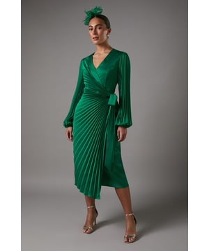 Elegant wrap design with a flattering V-neckline
        Striking pleated detail radiating from the waist
        Long, voluminous sleeves with gathered cuffs
        Luxurious satin fabric for a lustrous finish
        Midi length perfect for formal occasions
    
    Make a statement at your next special event with this captivating satin pleated wrap dress. The wrap silhouette creates a figure-flattering shape, while the radial pleating adds a touch of drama and movement. The long, billowing sleeves provide a romantic flair, perfectly balanced by the sleek midi length. Ideal for weddings, race days, or sophisticated soires, this dress can be styled with strappy metallic heels and a clutch bag for a polished ensemble. For cooler evenings, drape a pashmina over your shoulders to maintain an air of elegance. The versatile design allows for effortless transition from day to night, ensuring you'll be the epitome of grace and style throughout any occasion.