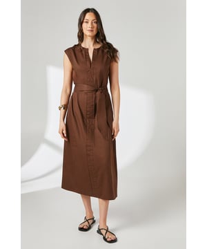 Crafted from pure cotton for breathable comfort throughout the day
        Elegant notch neck design with button-through front for versatile styling options
        Flattering tie waist belt to accentuate your silhouette
        Sleeveless cut perfect for layering or wearing alone during warmer days
        Midi length offering sophisticated coverage and ease of movement
    
    This Principles notch neck midi dress combines timeless style with everyday practicality. The clean lines and structured woven cotton fabric create a polished silhouette that works beautifully for various daytime occasions. Style with flat sandals as shown for a relaxed weekend brunch or family gathering, or pair with a cropped denim jacket and trainers for casual outings. The versatile button-through design allows for customised styling-wear fully buttoned for a more refined look or slightly open at the neck for a relaxed feel. The tie waist detail adds definition whilst maintaining comfort, making this dress a wardrobe essential that transitions effortlessly from casual coffee dates to informal office settings. Accessorise with simple gold-toned jewellery to complete this understated yet sophisticated daywear look.