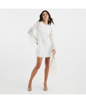 Round neckline, Long sleeves, Embroidered detail, 3D floral applique, Mini lengthAbout the brandFASHION IS OUR DNARiver Island is an icon of the British high street. Inspired by the latest trends and our heritage style archives, we've been serving style and leading trends for over sixty years.We make fashion for real people with real lives, who want to look real good. Because life's a celebration - let's dress for it.