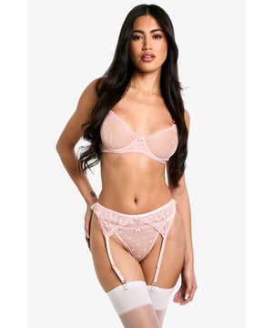 Delicate mesh fabric for a sultry, sheer look
        Charming bow detail adds a playful touch
        Thong style for minimal coverage
        Adjustable garter straps for a customisable fit
        Matching bra available for a coordinated set
    
    Indulge in romantic allure with this captivating mesh thong from Boohoo. Designed with Valentine's Day in mind, this piece combines seductive transparency with sweet details. The delicate mesh fabric offers a tantalising glimpse, while the adorable bow accent adds a touch of whimsy. The thong cut provides minimal coverage, perfect for a sleek silhouette under your favourite outfit. Adjustable garter straps allow you to create your desired look, whether worn alone or paired with stockings for added glamour. For a complete ensemble, team with the matching bra and prepare to dazzle. This versatile piece is ideal for those special nights in or as a confidence-boosting foundation for your day-to-day wardrobe.