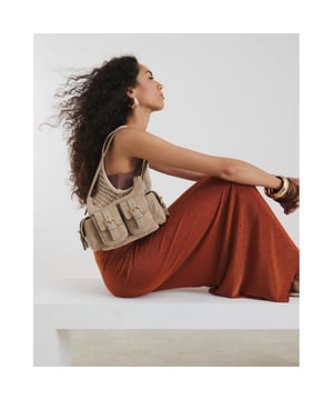 Shoulder strap, Buckle pockets, Embossed branding, Zipped fastening, W 23cm x D 8cmAbout the brandFASHION IS OUR DNARiver Island is an icon of the British high street. Inspired by the latest trends and our heritage style archives, we've been serving style and leading trends for over sixty years.We make fashion for real people with real lives, who want to look real good. Because life's a celebration - let's dress for it.