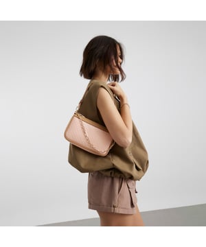 90s style, Patent fabric, RI monogram print, Zipped fastening, Chained grab handle, Adjustable strap, Handle length: 22cm, Bag dimensions: L: 15.5cm x D: 4.5cm x W: 24cmAbout the brandFASHION IS OUR DNARiver Island is an icon of the British high street. Inspired by the latest trends and our heritage style archives, we've been serving style and leading trends for over sixty years.We make fashion for real people with real lives, who want to look real good. Because life's a celebration - let's dress for it.