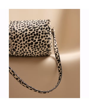 Animal print, Leather, Fluffy texture, Adjustable shoulder strap, Zip fastening, Handle drop: 26cm, H: 13.5cm x W: 24cm x D: 11cmAbout the brandFASHION IS OUR DNARiver Island is an icon of the British high street. Inspired by the latest trends and our heritage style archives, we've been serving style and leading trends for over sixty years.We make fashion for real people with real lives, who want to look real good. Because life's a celebration - let's dress for it.