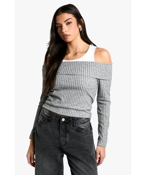 Trendy one-shoulder design with ribbed texture
        Versatile off-the-shoulder styling option
        Fitted silhouette for a flattering shape
        Long sleeves for added warmth and style
        Soft cotton fabric for comfort and breathability
    
    This chic ribbed top from Boohoo is the perfect addition to your casual wardrobe. The unique one-shoulder design with an off-the-shoulder option allows for versatile styling, making it ideal for various occasions. Pair it with your favourite high-waisted jeans and trainers for a laid-back daytime look, or dress it up with wide-leg trousers and statement earrings for a night out with friends. The fitted silhouette accentuates your curves while the ribbed texture adds visual interest. Suitable for family gatherings, brunches, or casual outings, this top can be easily dressed up or down. Layer it under a leather jacket for cooler evenings or wear it on its own during warmer days. The long sleeves provide coverage and make it a great transitional piece for unpredictable British weather.