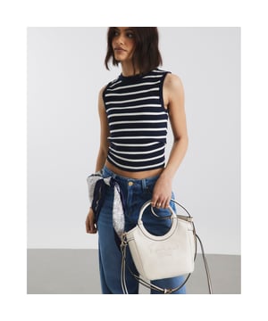 Faux leather fabric, Embossed branding, Side tie detail, Rounded handle, Popper fastening, Adjustable strap, Handle drop: 60cm, Bag dimensions: L: 20cm x D: 14cm x W: 22cmAbout the brandFASHION IS OUR DNARiver Island is an icon of the British high street. Inspired by the latest trends and our heritage style archives, we've been serving style and leading trends for over sixty years.We make fashion for real people with real lives, who want to look real good. Because life's a celebration - let's dress for it.