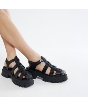 Faux leather fabric, Chunky detail, Cross strapped, Ankle strapped, Backless, Flat solesAbout the brandFASHION IS OUR DNARiver Island is an icon of the British high street. Inspired by the latest trends and our heritage style archives, we've been serving style and leading trends for over sixty years.We make fashion for real people with real lives, who want to look real good. Because life's a celebration - let's dress for it.