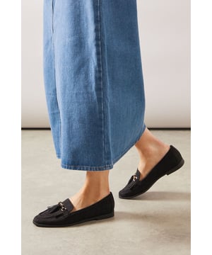 Wide fit design provides extra room and comfort for all-day wear
        Decorative tassels add a stylish finishing touch to these classic loafers
        Flat heel measuring between 0-2cm offers practical comfort without sacrificing style
        Faux suede upper creates a sophisticated texture and appearance
        Cushioned insole provides enhanced comfort for extended periods on your feet
    
    These Laura loafers from our Good For The Sole collection combine timeless style with exceptional comfort. The wide fit design ensures a roomy feel that accommodates various foot shapes, whilst the decorative tassels add a touch of sophistication to this classic silhouette. Style them with rolled-up jeans for a casual weekend look, or pair with tailored trousers and a crisp blouse for smart-casual office attire. The flat heel makes these loafers perfect for busy days when you're constantly on the move but don't want to compromise on style. Their versatility extends to seasonal wear - team with ankle-grazing trousers in warmer months or with tights and a skirt when temperatures drop. These loafers are the ideal addition to your footwear collection, offering both practicality and effortless chic for numerous occasions.