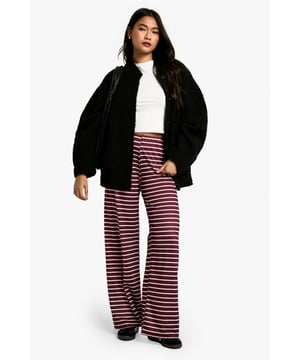 Striking horizontal stripe pattern
        High-waisted design for a flattering silhouette
        Wide-leg cut for maximum comfort and style
        Soft, stretchy fabric for all-day wear
        Versatile piece suitable for various casual occasions
    
    Make a bold statement with these eye-catching striped trousers from Boohoo. The wide-leg cut and high-waisted design create a lengthening effect, perfect for all body types. The soft, stretchy fabric ensures comfort without compromising on style, making these trousers ideal for long days out or relaxed evenings in. Pair them with a crisp white tee and oversized cardigan for a chic, laid-back look. For a more polished ensemble, team with a fitted blazer and ankle boots. These trousers are a versatile addition to your wardrobe, suitable for family gatherings, brunch dates, or casual Fridays at the office. The horizontal stripes add a playful touch to your outfit, allowing you to express your fun-loving personality whilst staying on-trend. Embrace the comfort and style of these must-have trousers that effortlessly blend fashion-forward design with everyday wearability.