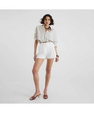 Longline fit, Belted, Pleated, Pockets, Zip and hook fasteningAbout the brandFASHION IS OUR DNARiver Island is an icon of the British high street. Inspired by the latest trends and our heritage style archives, we've been serving style and leading trends for over sixty years.We make fashion for real people with real lives, who want to look real good. Because life's a celebration - let's dress for it.