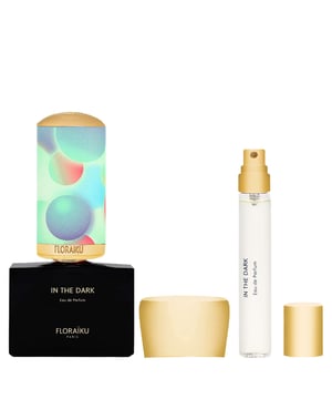 Discover the enchanting Floraiku In The Dark Eau de Parfum Gift Set, featuring a 50ml and a 10ml bottle of this mesmerizing fragrance. "In the Dark" captivates the senses with its sparkling notes of bergamot, lemon, and sweet orange, complemented by refreshing peppermint. The heart reveals a luxurious blend of Turkish rose absolute and clove leaf essence, while the base notes of patchouli, olibanum, cedarwood, and incense provide a warm finish. This exquisite set includes a stylish travel case, perfect for elegance on-the-go.